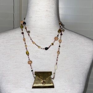 Necklace with wood beads and Pendant